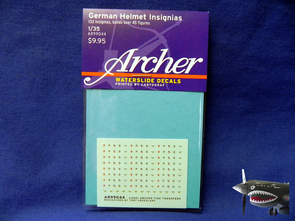 AR99044 German Helmet Insignias.JPG