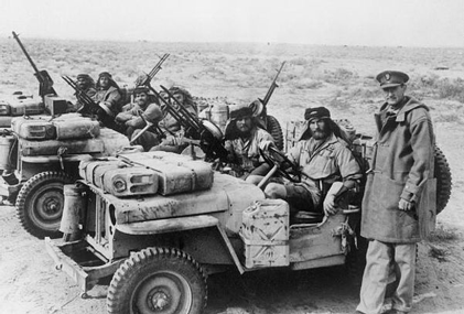 Colonel-David-Stirling-with-SAS-jeeps.gif