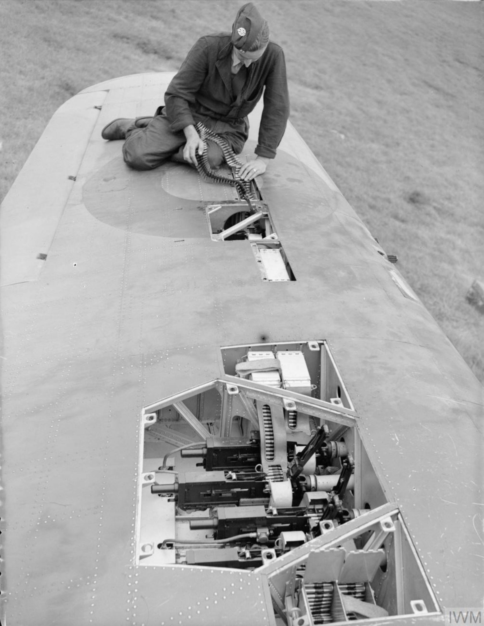 Hawker-Hurricane-IIb-RAF-3Sqn-showing-the-gun-bays-at-Hunsdon-Hertfordshire-IWM-CH3522.jpg Hawker-Hurricane-IIb-RAF-3Sqn-showing-the-gun-bays-at-Hunsdon-Hertfordshire-IWM-CH3522.jpg