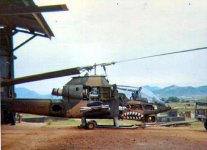AH-1G 528 Calico Cat in maintenance Delta1-10cav.jpg