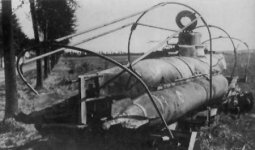 A_damaged_and_abandoned_Biber_on_its_transportation_trailer..jpg