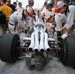 richie-ginther-waits-as-his-crew-works-on-his-honda-ra273-v0--sFSMc9W1lg8TPSka7VrGbfln9RCxmu6X...jpg