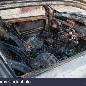 interior-of-a-burnt-out-car-london-england-uk-DR8BHE.jpg