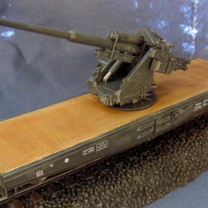 German Flatcar Type SSYMS 60 with 128mm gun III.jpg