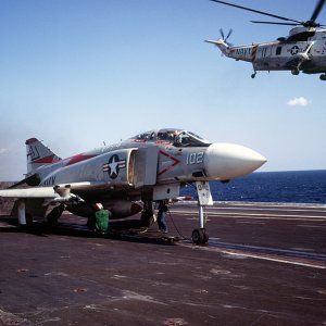 F-4J_and_SH-3G_on_USS_America_28CVA-6629_1972-73.JPEG