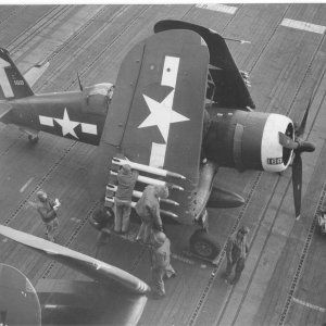 F4U-1DCorsairofVF-84onthedeckofUSSBunkerHillCV-17withwingsfolded_zps79710111.jpg