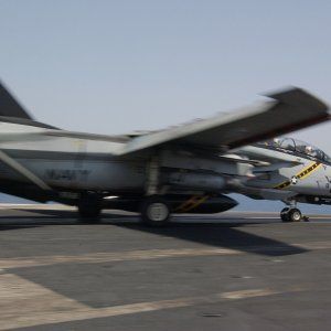 US_Navy_040709-N-4374S-016_An_F-14D_Tomcat_assigned_to_the_Jolly_Rogers_of_Fighter_Squadron_One_Zero_Three_28VF-10329_launches_from_the_flight_deck_ab