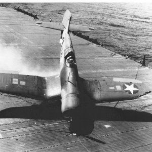 F4U-1CorsairaircraftofVF-17islandingonthenoseontheflightdeckofUSSBunkerHillCV-19_zps4012d335.jpg