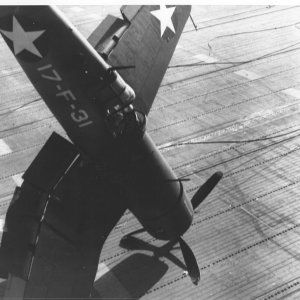 F4U-1CorsairaircraftofVF-17istrippedupbyacableinlandingonthedeckofUSSBunkerHillCV-17_zps843f6dca.jpg