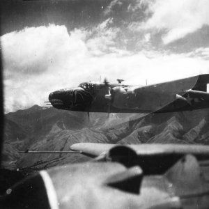 B-25_New_Guinea_Bat_Outa_Hell_Bombers_On_Way_To_Target_1944.jpg