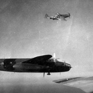 P-51D_of_the_325th_FG_escorting_a_12th_AF_B-25J_340_BG_over_Italy_during_1945.jpg