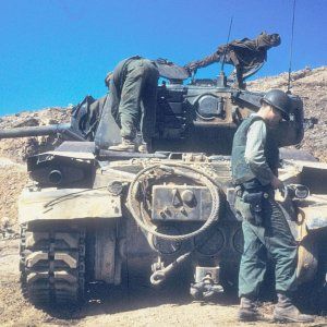 USAF_forward_air_controller_with_US_Army_M46_tank_during_Korean_War_281950-195329.jpg