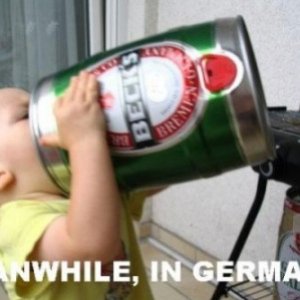 funny-kid-drinking-beer-from-5l-barrel-445x299.jpg