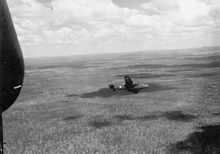 B-25_Mitchell_Bomber_Over_Jungle.jpg