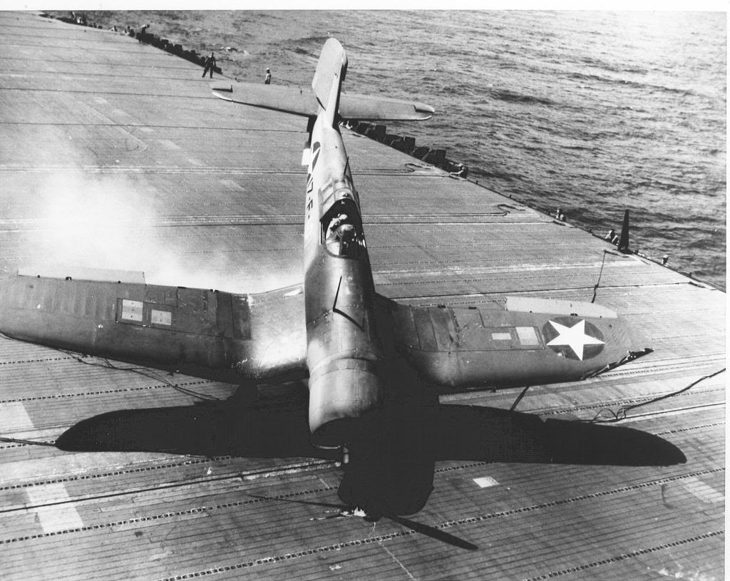 F4U-1CorsairaircraftofVF-17islandingonthenoseontheflightdeckofUSSBunkerHillCV-19_zps4012d335.jpg