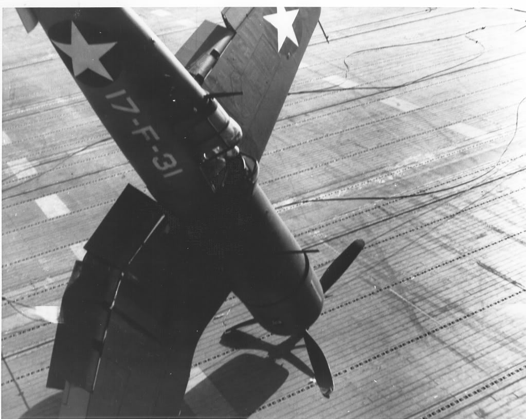 F4U-1CorsairaircraftofVF-17istrippedupbyacableinlandingonthedeckofUSSBunkerHillCV-17_zps843f6dca.jpg