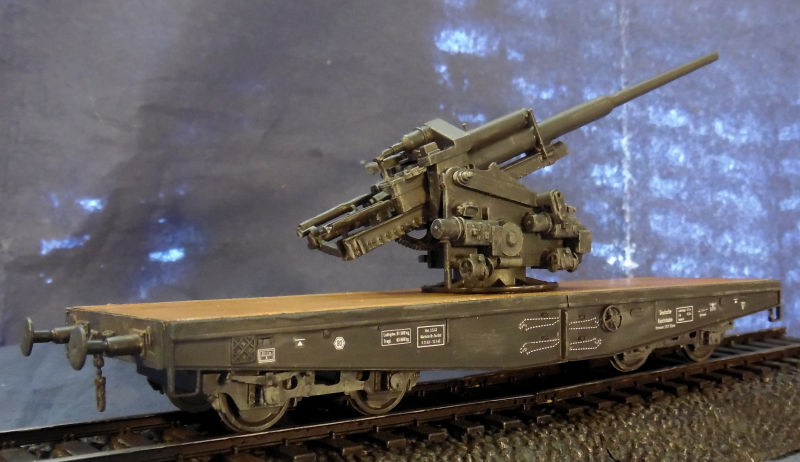 German Flatcar Type SSYMS 60 with 128mm gun II.jpg