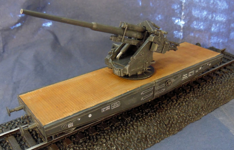 German Flatcar Type SSYMS 60 with 128mm gun III.jpg