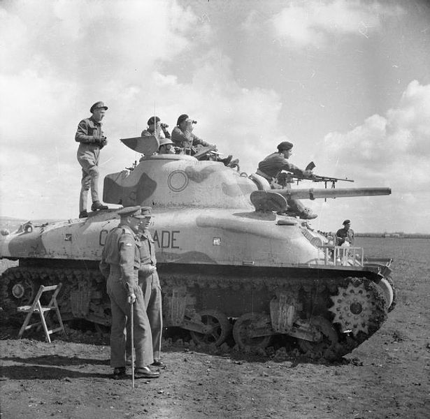 Holmes-GOC-9th-Army-stands-on-a-Sherman-II-tank.jpg