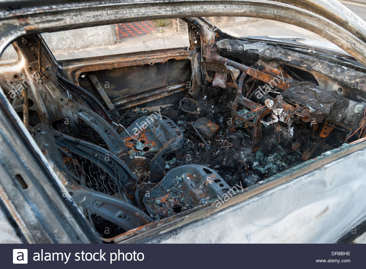 interior-of-a-burnt-out-car-london-england-uk-DR8BHE.jpg