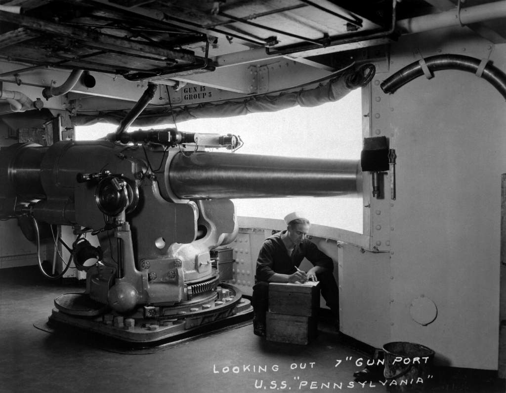 Looking-out-5-Inch-gun-port-of-the-Pennsylvania-BB-38-Ca_-1918_-Note-the-caption-says-72727-inch-gun22_-historyinfotos.jpg