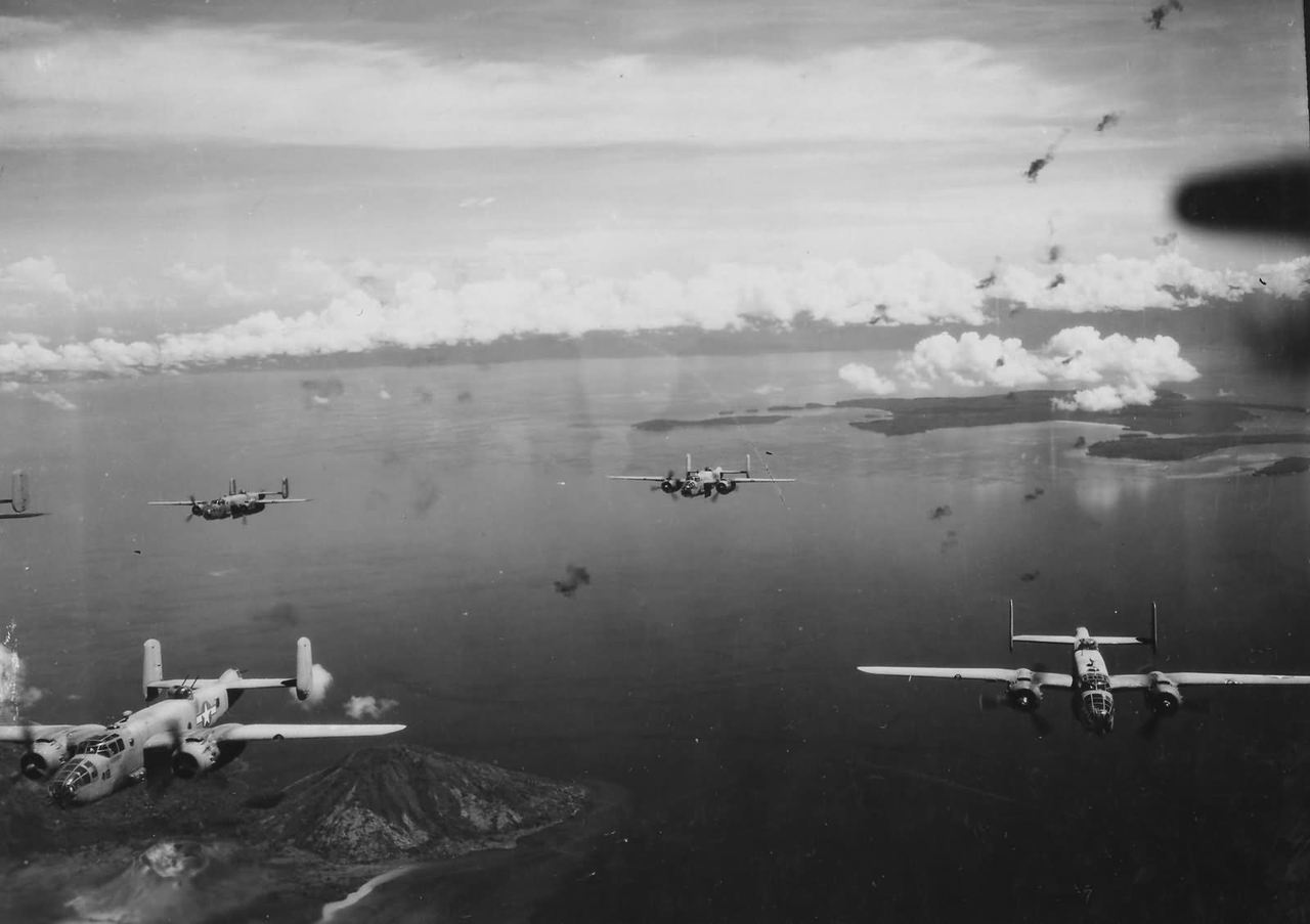 PBJ_Mitchell_Bombers_in_Heavy_AA_Fire_Rabaul_1944.jpg