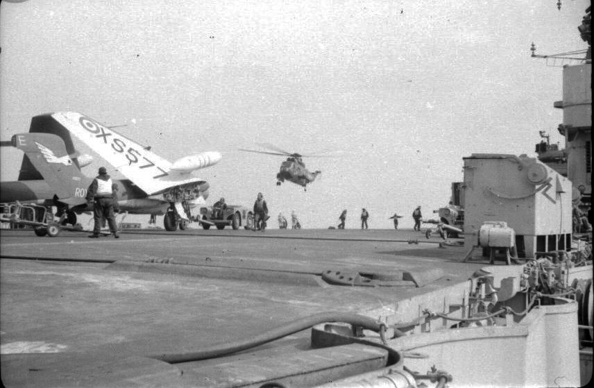 Sea_King_landing_on_Eagle_with_Sea_Vixen_XS577_in_foreground.jpg