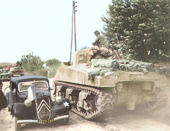 756th_tank_battalion_tank_passing_a_french_staff_car_20100508_1950326637.jpg