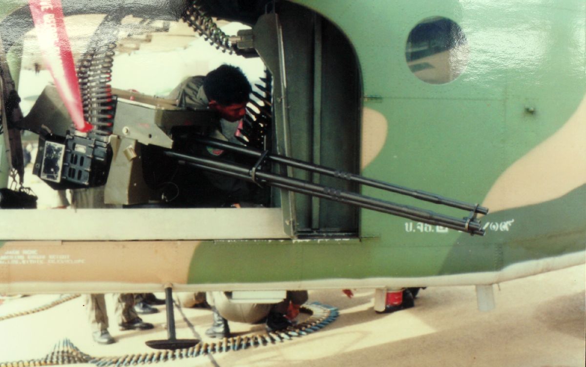 Fairchild_AU-23A_Peacemaker_with_XM197_20mm_cannon.jpg
